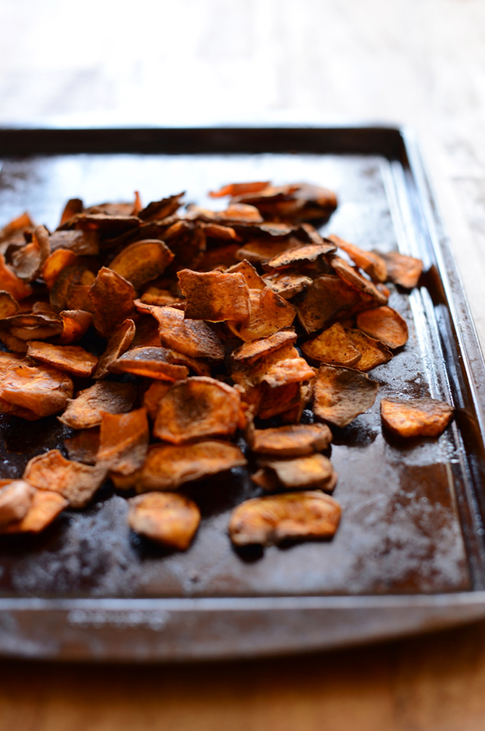 Baking sheet with a batch of freshly baked homemade Sweet Potato Chips