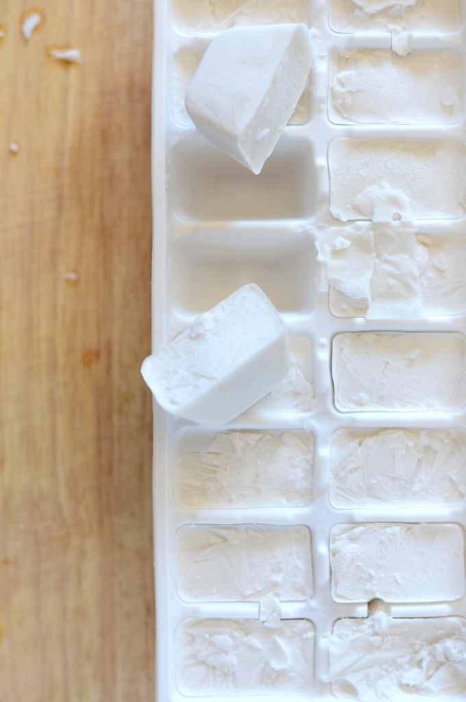 Tray of coconut milk ice cubes for making a homemade vegan frappuccino