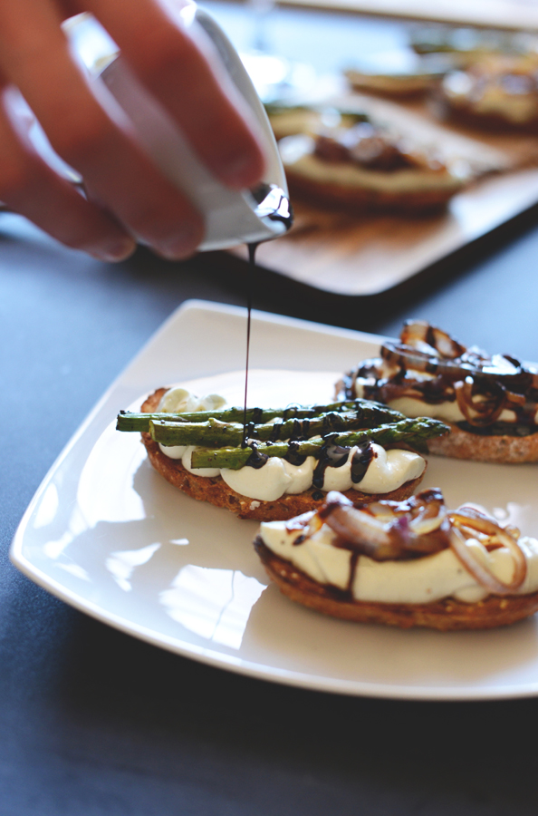 Drizzling balsamic reduction onto our Bleu Cheese Bites for a delicious vegetarian appetizer