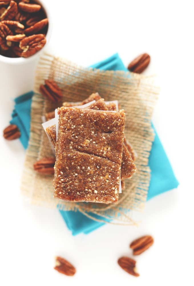 Stack of our Boozy Pecan Pie Bars recipe topped with sea salt