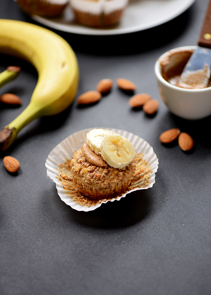 Banana Almond Meal Muffin topped with almond butter and sliced bananas