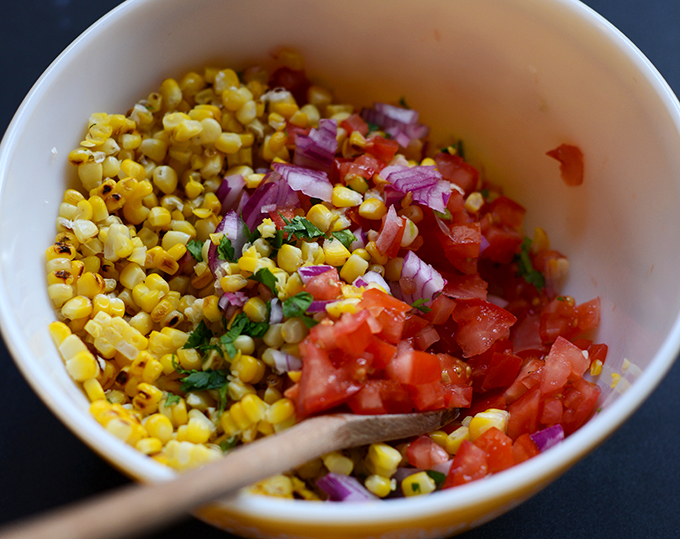 Bowl of ingredients for making our Grilled Corn Salsa recipe