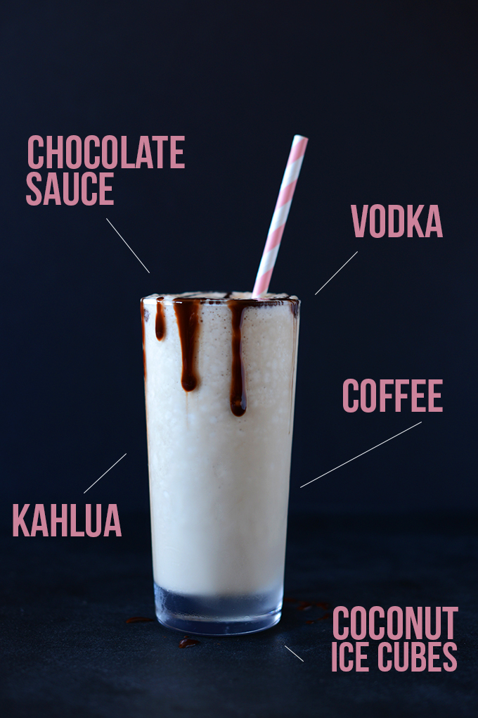 Indicating kahlua, coconut ice cubes, and other ingredients in our Vegan White Russian recipe