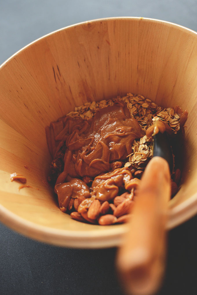Stirring together ingredients for homemade Peanut Butter Granola Bars