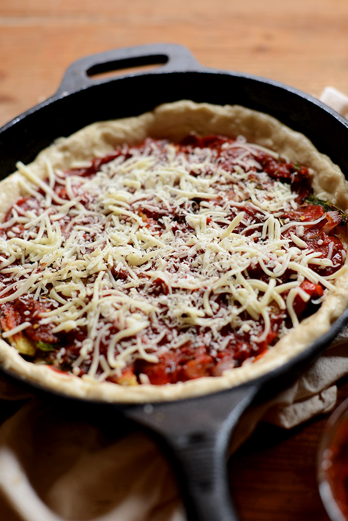 Skillet containing our Deep Dish Pizza with Roasted Veggies