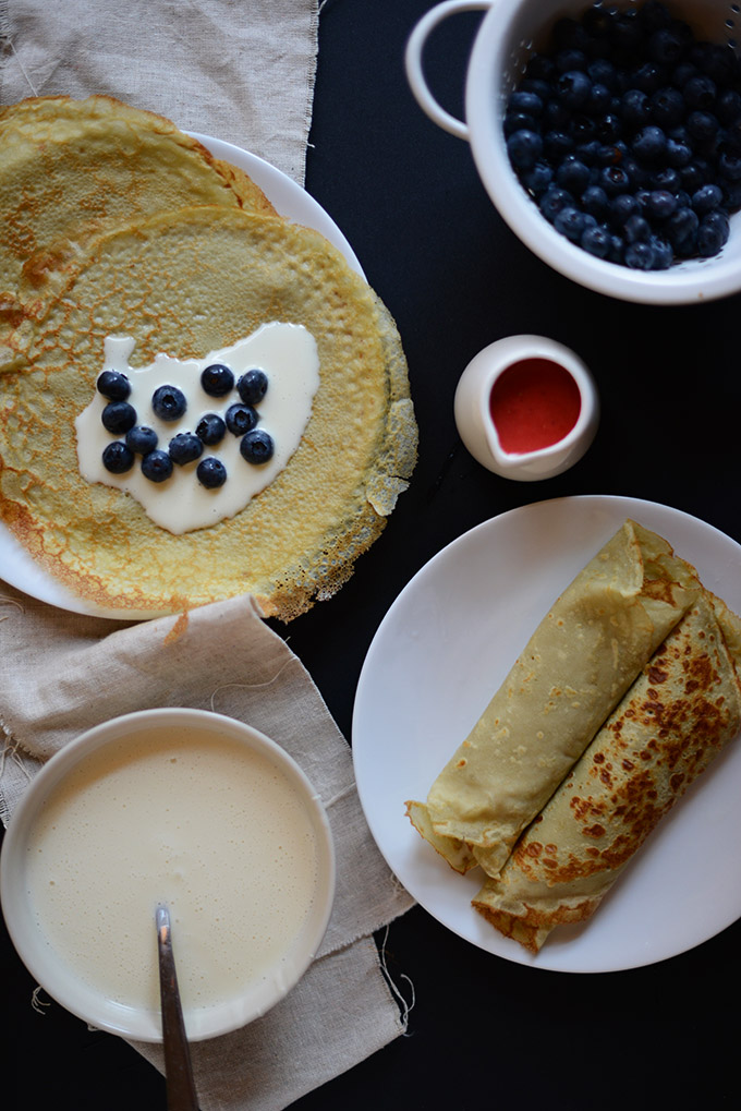 Gluten-Free Green Tea Crepes filled with White Chocolate Coconut Filling and fresh blueberries