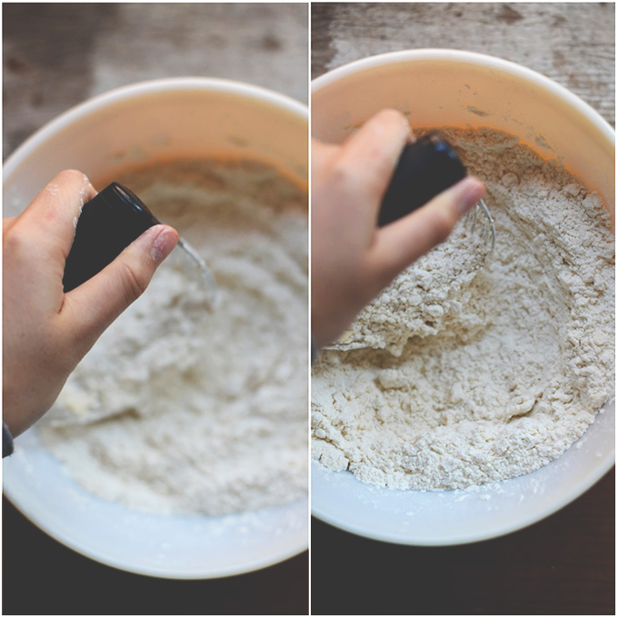 Using a pastry cutter to mix vegan butter and flour