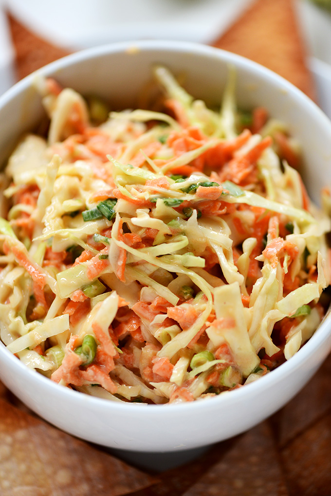 Close up shot of a small bowl of our delicious Creamy Thai Slaw recipe