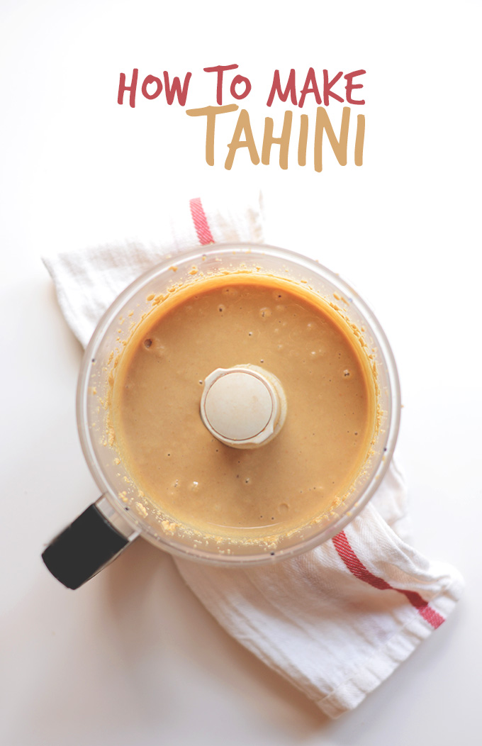 Food processor filled with creamy homemade tahini