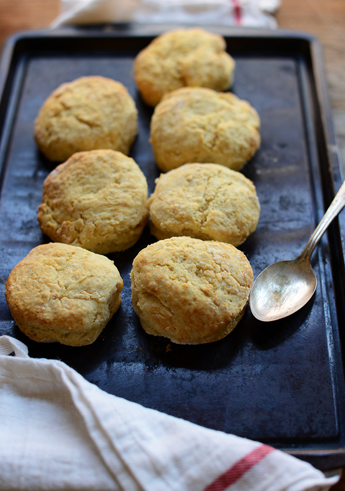Batch of our Best Damn Vegan Biscuits recipe resting on a baking sheet