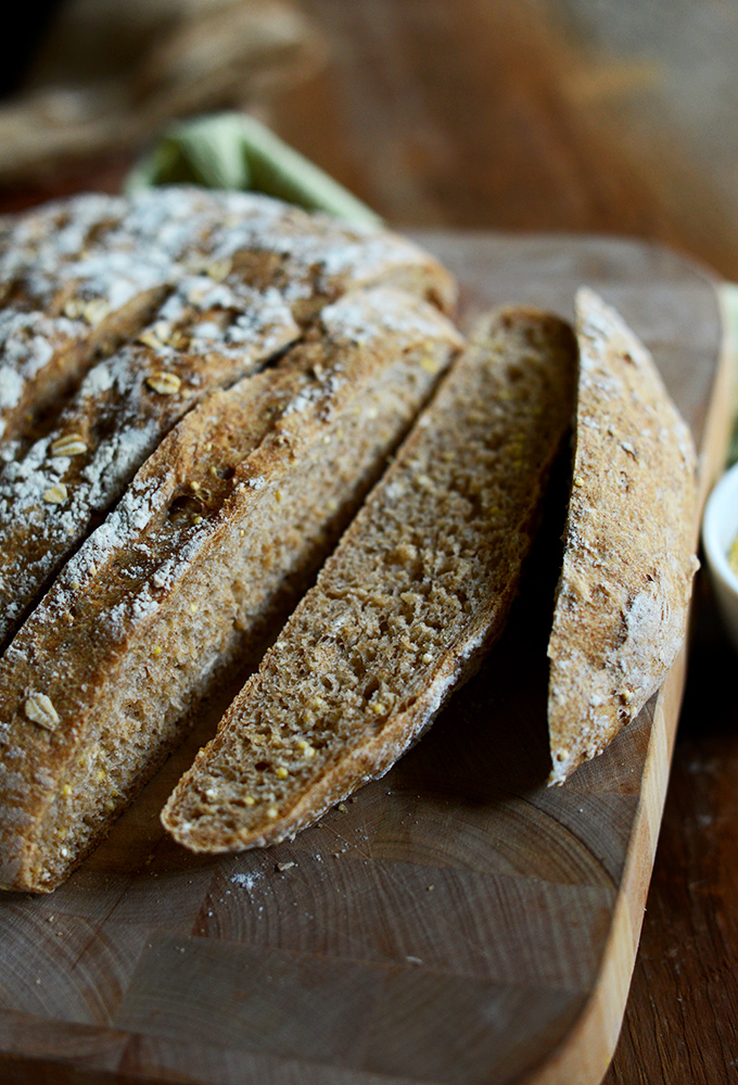 Freshly sliced loaf of homemade vegan wheat bread