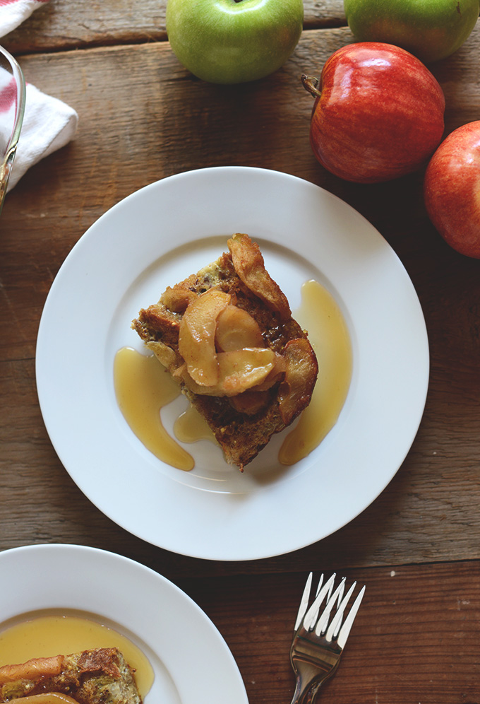 Plate with a slice of Baked Apple French Toast with maple syrup