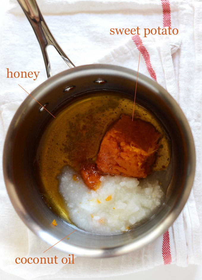 Coconut oil, honey, and sweet potato in a saucepan