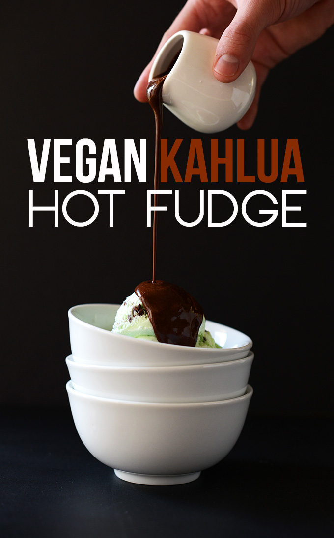 Pouring Vegan Kahlua Hot Fudge onto scoops of ice cream