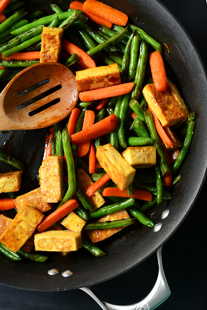 Cooking our Easy Tofu Stir-Fry recipe in a skillet