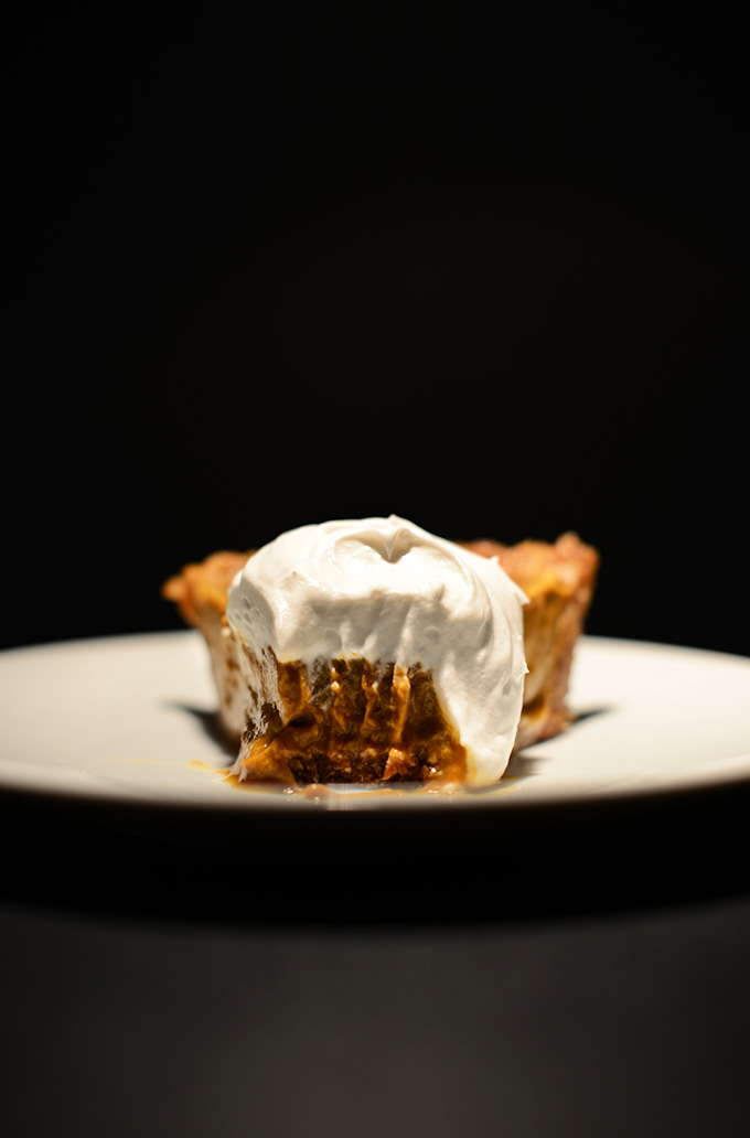 Slice of No-Bake Vegan Pumpkin Pie with the tip removed