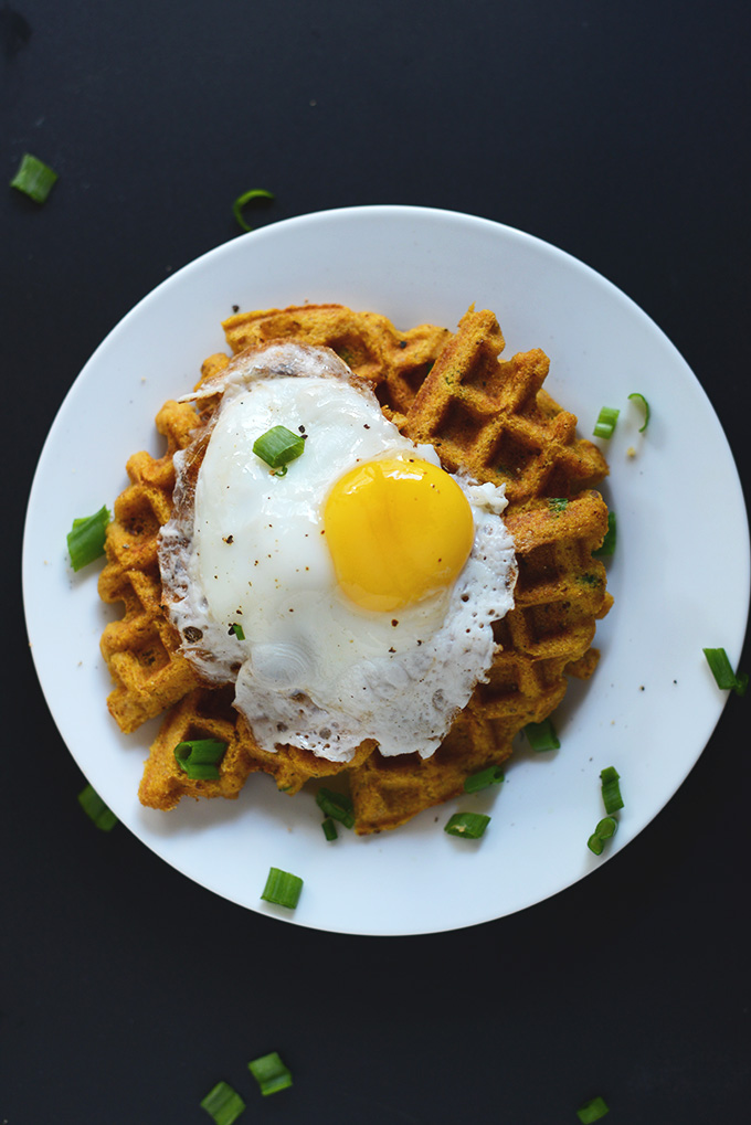 Plate with a Savory Pumpkin Cornbread Waffle topped with a fried egg