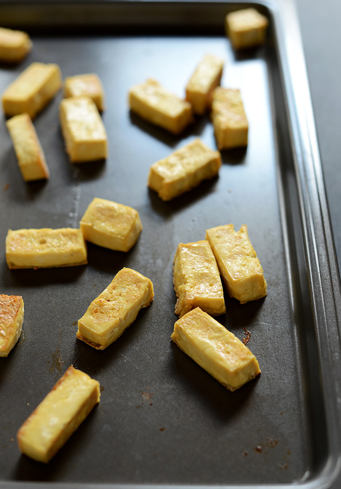 Baking sheet with strips of delicious baked tofu
