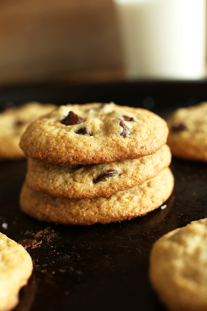 Stack of easy to make Gluten-Free Chocolate Chip Cookies on a baking sheet