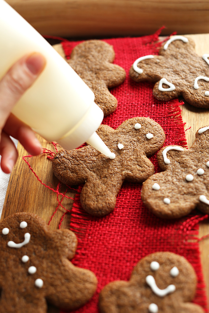 Using a squeeze bottle to decorate Gluten-Free Gingerbread Men