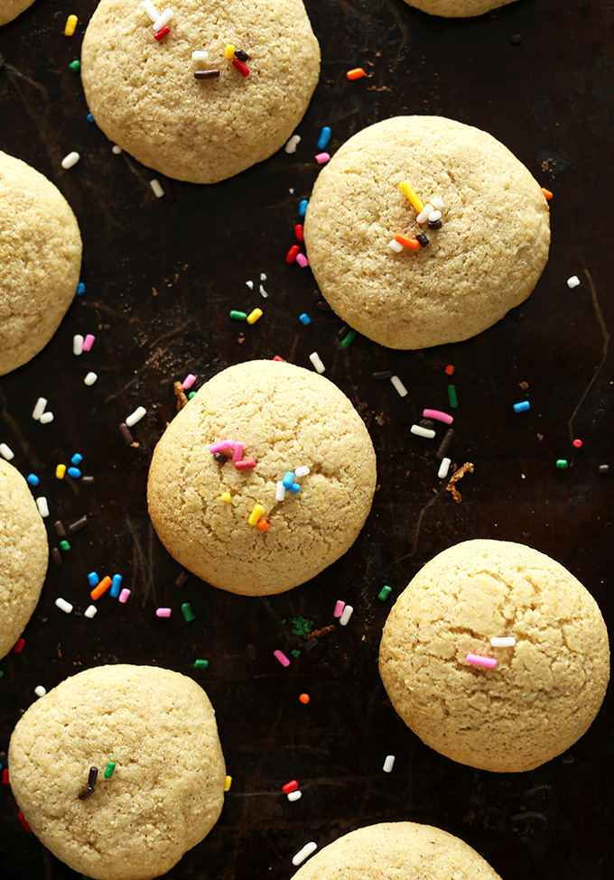 Batch of homemade Gluten-Free Sugar Cookies topped with rainbow sprinkles