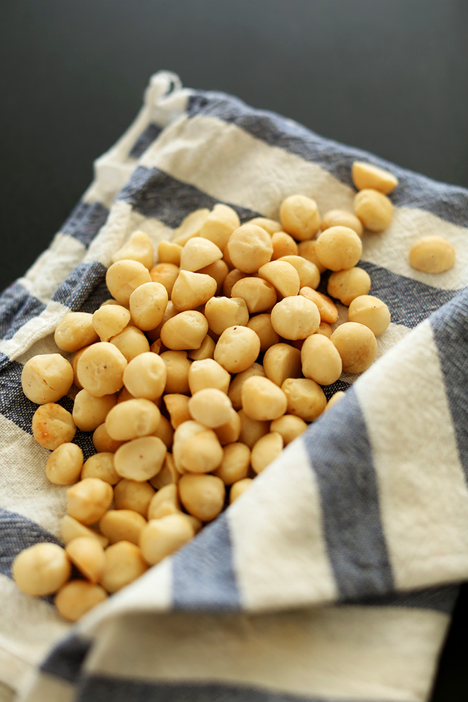 Macadamia nuts resting on a kitchen towel
