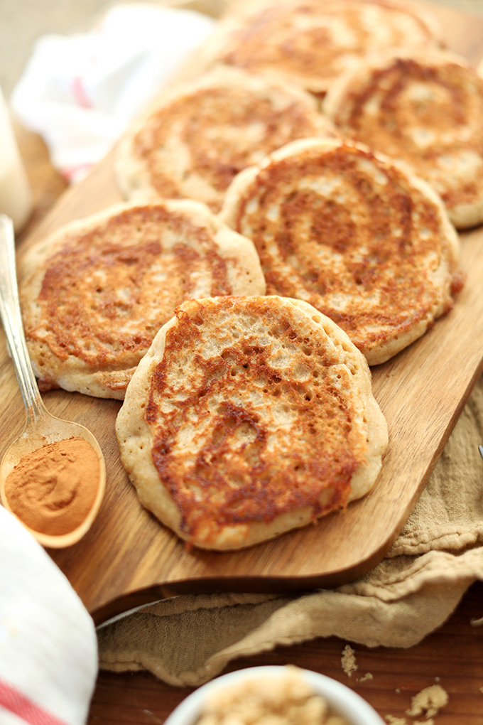 Batch of our Vegan Cinnamon Roll Pancakes recipe on a cutting board