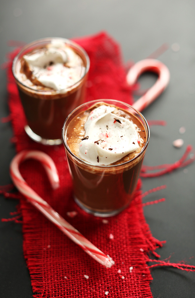 Top down shot of two glasses of Vegan Drinking Chocolate with Peppermint Candy Canes