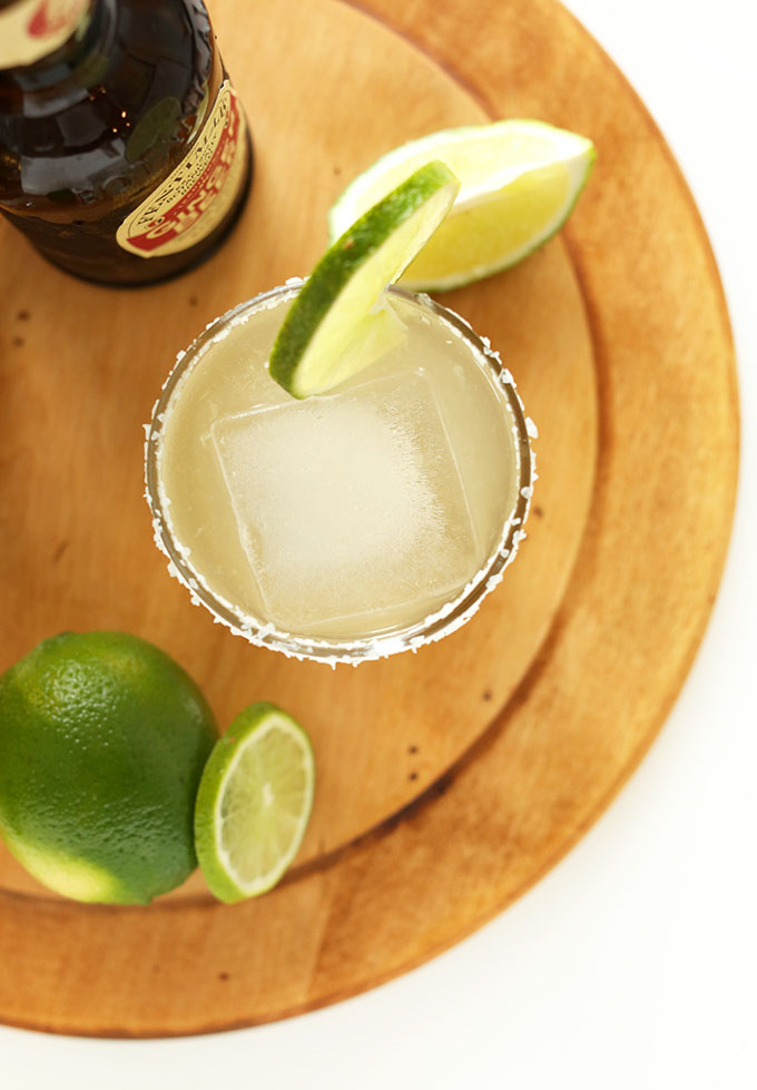 Top down shot of a homemade Ginger Beer Margarita with a salt and lime rim