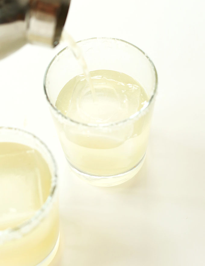Pouring our Ginger Beer Margarita recipe into a glass