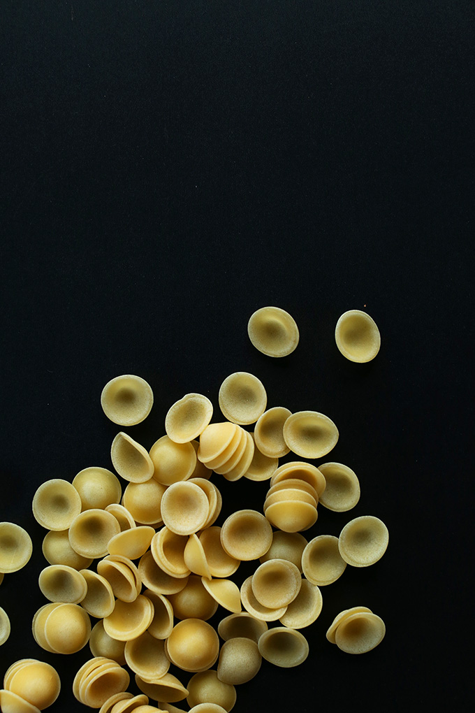Dry Orechiette Pasta on a dark background