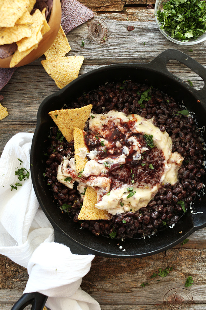 Skillet of Raspberry Chipotle Black Bean Dip and tortilla chips