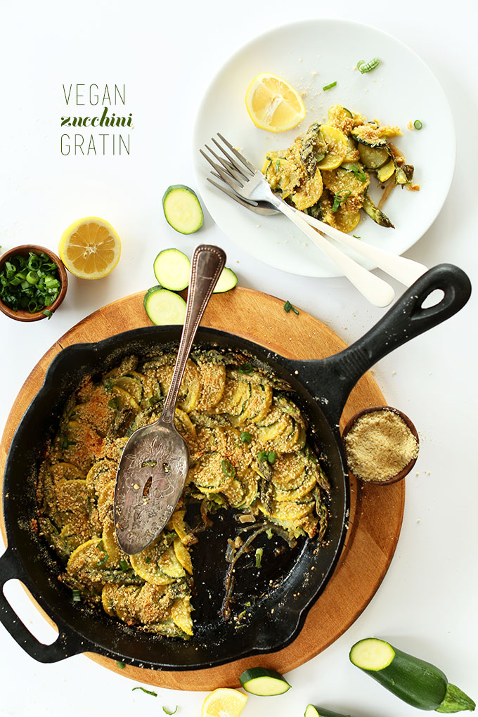 Skillet of Vegan Zucchini Gratin with a wedge removed