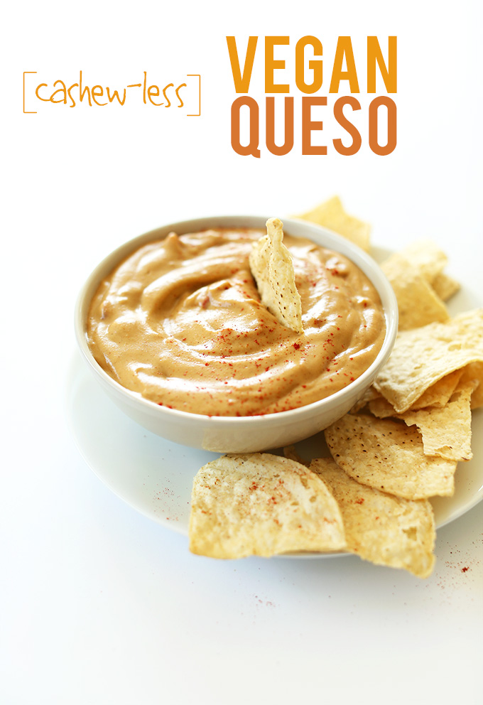 Tortilla chips and a bowl of Cashew-Less Vegan Queso 