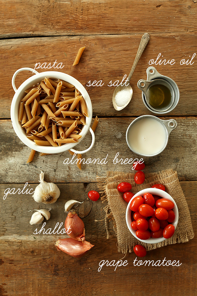 pasta, garlic, shallots, tomatoes and other ingredients for Dairy-Free Creamy Garlic Pasta