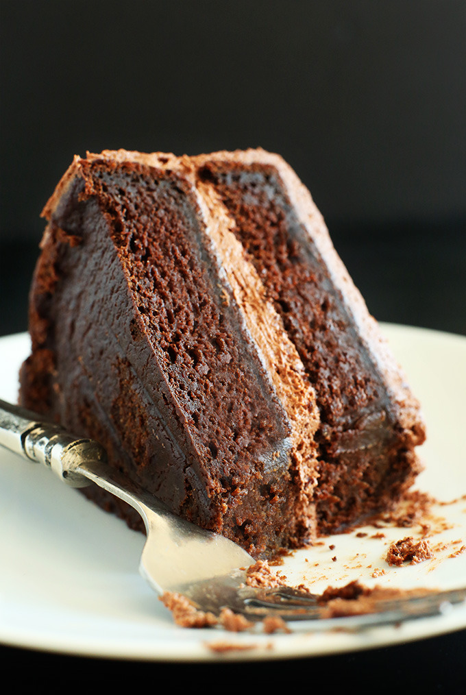 Slice of delicious and moist Vegan Chocolate Cake for dessert