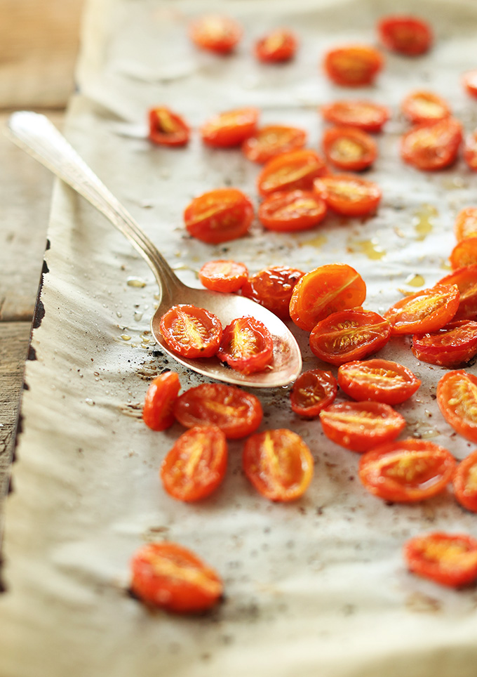 Parchment-lined baking sheet with freshly Roasted Tomatoes