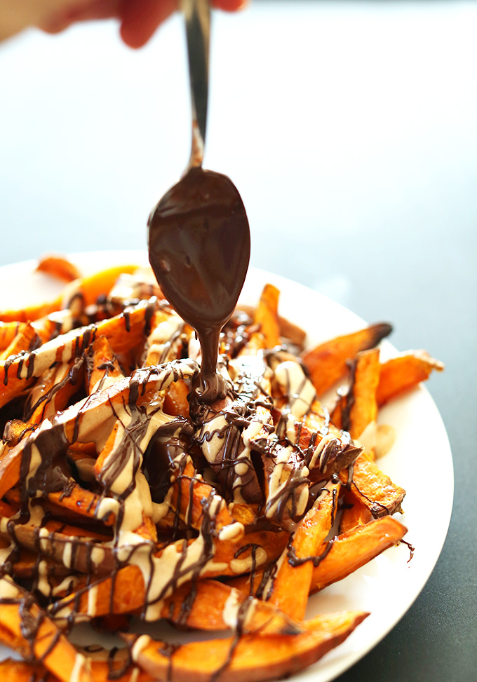 Using a spoon to add a chocolate drizzle over Sweet Potato Dessert Fries