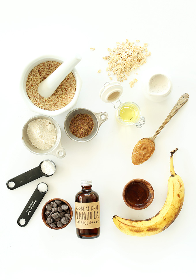 Banana, oats, peanut butter and other ingredients for making gluten-free vegan pancakes