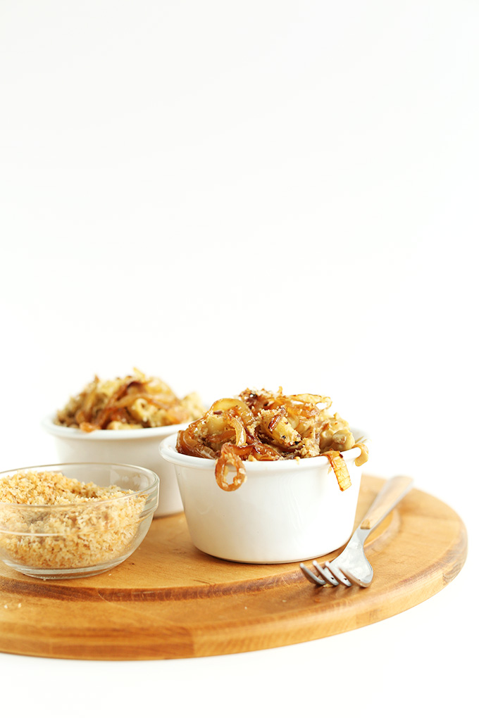 Bowls of Vegan Caramelized Onion Mac n Cheese with breadcrumbs