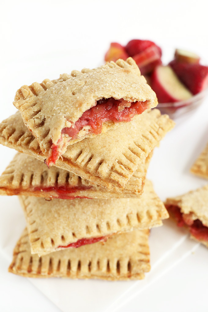 Close up shot of homemade vegan pop tarts revealing the delicious Strawberry Rhubarb filling