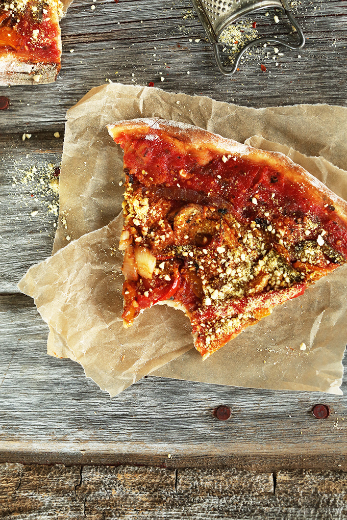 Slice of pizza from our Best Vegan Pizza recipe