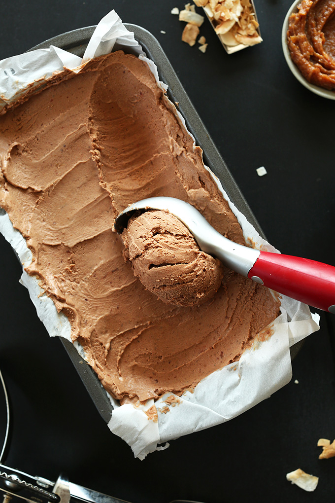 Scooping up No-Churn Vegan Chocolate Ice Cream made with dates