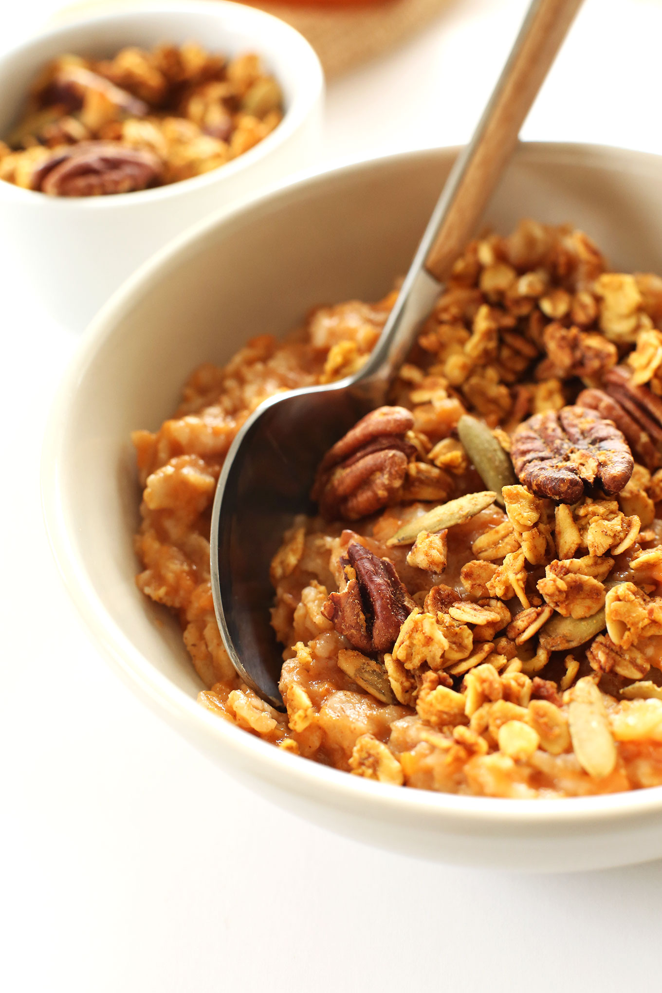 Close up shot of a bowl of our Sweet Potato Pie Oats for a healthy breakfast recipe