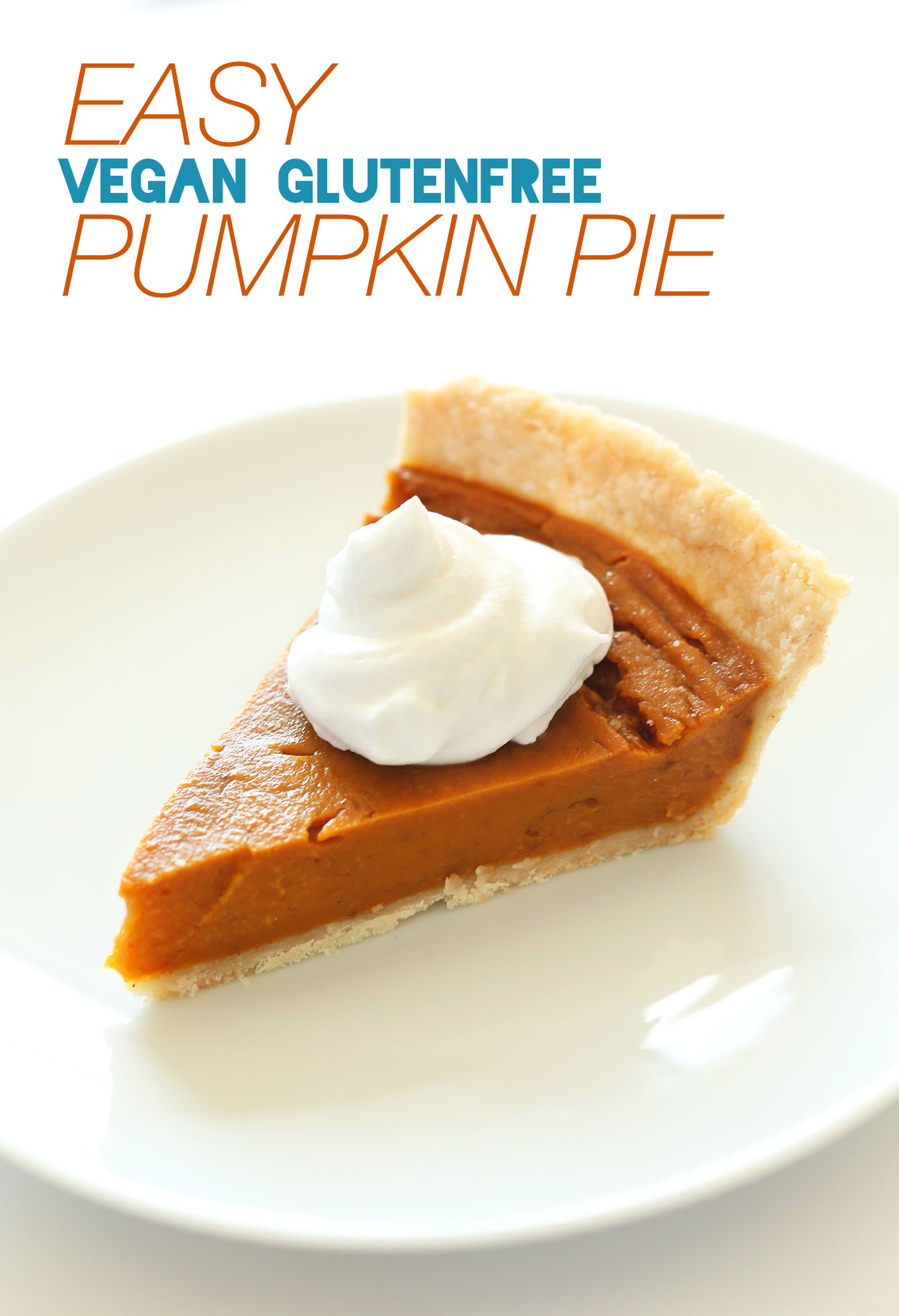 Slice of Vegan Gluten-Free Pumpkin Pie topped with coconut whipped cream