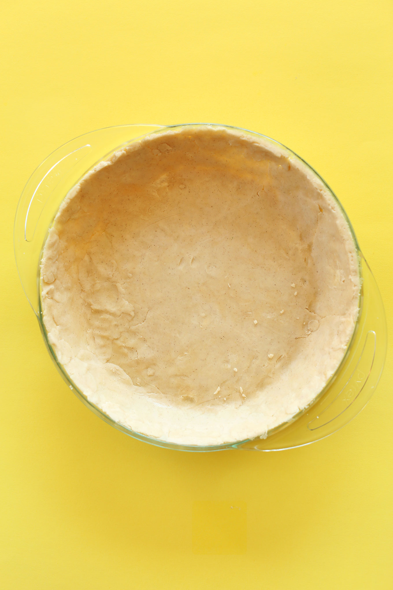 Gluten-free pie crust pressed into a pie pan