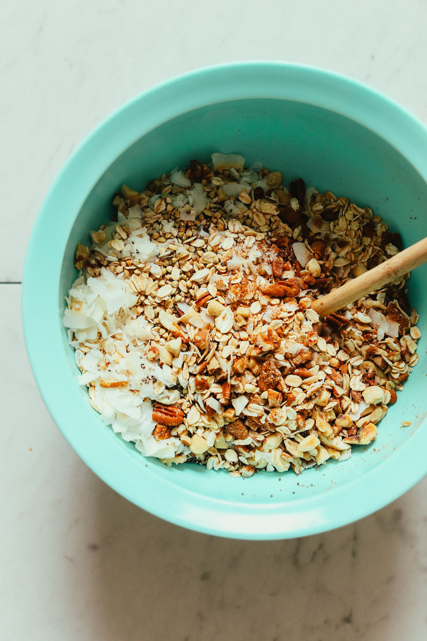 Stirring together dry ingredients for our Easy Buckwheat Granola recipe