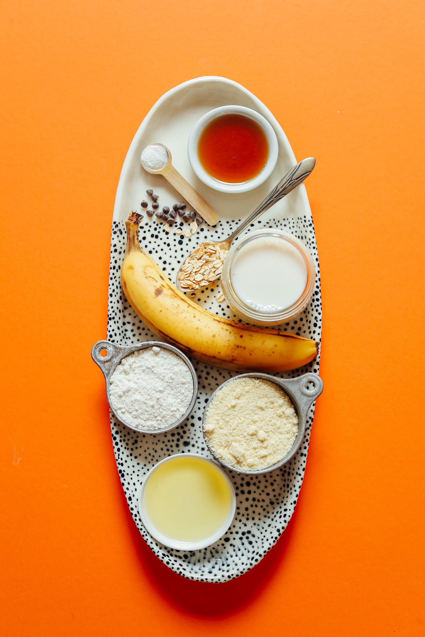 Platter of ingredients for making gluten-free vegan banana pancakes