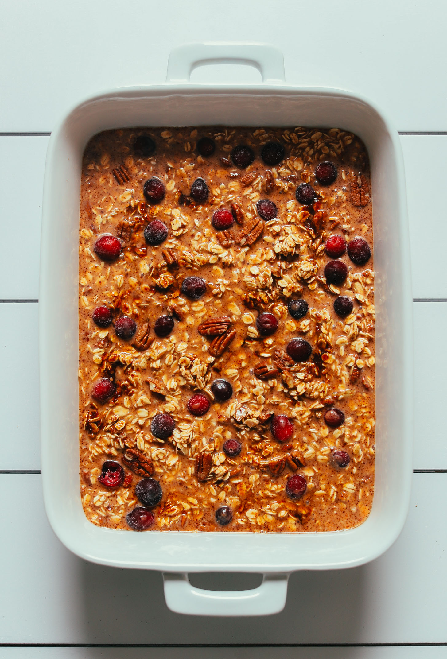 Baking dish of our Vegan Pumpkin Baked Oatmeal with Cranberries recipe