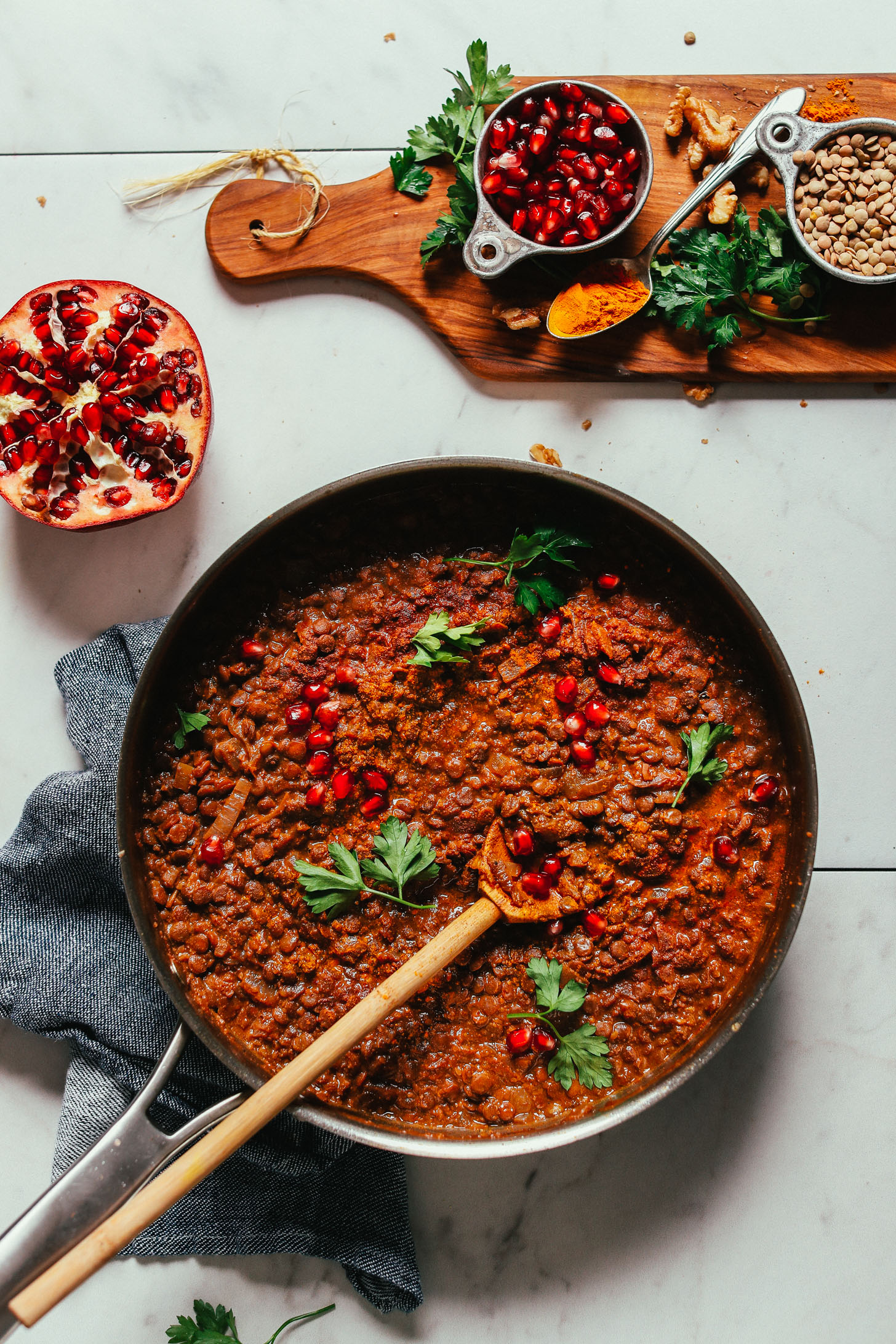 Skillet filled with hearty and flavorful Lentil Fesenjan